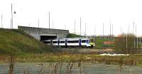 Naked looking Glasgow - Edinburgh shuttle approaching Edinburgh Park station under the city bypass link road, 2004.<br><br>[John Furnevel /05/2004]