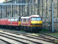 A Royal Mail train stabled at Carlisle on a sunny 16 June 2003 behind EWS 90034.<br><br>[John Furnevel 16/06/2003]