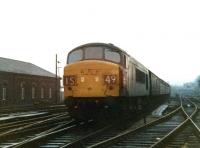 D28 passing Crown Street Goods depot on the approach to Carlisle on a wet Wednesday 12 January 1972. The train is the 1025 Leeds - Glasgow Central.<br><br>[John Furnevel 12/01/1972]