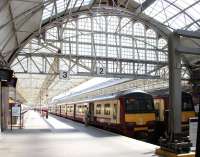 View of concourse and roof at Helensburgh Central in April 2005 with all 3 platforms occupied. This being a Saturday, much of the stock is stabled for the weekend.<br><br>[John Furnevel 23/04/2005]