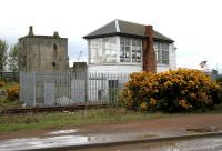 View west at Rosyth Dockyard signal box in April 2005. Rosyth Castle is in the background and to the right the Zeebrugge ferry is docked.<br><br>[John Furnevel 28/04/2005]