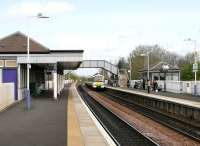 An Edinburgh bound train entering Dalmeny Station in April 2005.<br><br>[John Furnevel 30/04/2005]