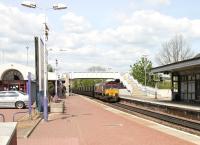 Platform view looking north at Inverkeithing Station in May 2005 with southbound coal empties approaching on their way back to Hunterston.<br><br>[John Furnevel 11/05/2005]