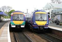 Contrasting ScotRail liveries - Kirkcaldy Station - May 2005.<br><br>[John Furnevel 18/05/2005]