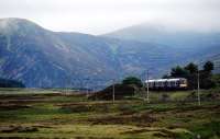 A southbound service heads away from Dalwhinnie and towards An Torc (the Boar of Badenoch) and the Druimuachdar Pass.<br><br>[Ewan Crawford 26/07/2010]