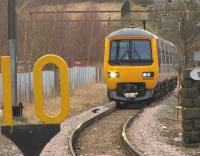 A class 323 arrives at Glossop in September 2009 with a service for Manchester.<br><br>[Ian Dinmore 28/09/2009]