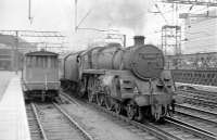 BR Standard Class 5 4-6-0 no 73059 leaves Glasgow Central with a Gourock train in February 1967. Note the blow from her right cylinder. We next see her a few weeks later on the ROF train at Bishopton when the leak has become much worse [see image 29881]. 73059 was withdrawn from Polmadie shed in May 1967.<br><br>[Colin Miller /02/1967]