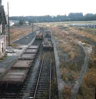 Demolition and recovery work in progress at Kelso station in 1970. View is north east from the now demolished road bridge towards Coldstream along what would eventually become the route of the A698 by-pass. [See image 27928]<br><br>[Bruce McCartney //1970]