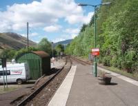 Looking south at Arrochar and Tarbet. [See image 30114] for a view of the same location in 1976. Since that time the platform has been extended and radio signalling has removed the need for semaphores but the green engineers hut appears unchanged.<br><br>[Mark Bartlett 26/05/2010]