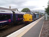 The <I>Northern Belle</I> passes a Scotrail Turbostar at Carrbridge on 7th August 2010.<br><br>[Gus Carnegie 07/08/2010]