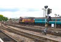 EWS liveried 67016 brings up the rear of the 1400 Cardiff Central - Taunton summer service as it runs into Bristol Temple Meads station on 5 August 2010. DBS 67018 <I>Keith Heller</I>  was on the front of the train. [See image 30129]<br><br>[Peter Todd 05/08/2010]