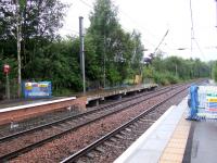 Platform extension work taking place at Johnstone to allow seven car trains to be accommodated at the station when the new Class 380 comes into service. This work is being repeated at a number of stations across the Inverclyde and Ayrshire routes where the Class 380 will operate.<br><br>[Graham Morgan 09/08/2010]