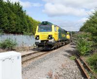 Freightliner 70004 passing Ashton Gate with a loaded coal train from Portbury import terminal, where it would have commenced its journey shortly after 10am on the morning of 9 August. The train is heading for the main line at Parson Street Junction.<br><br>[Peter Todd 09/08/2010]