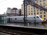 Waiting to depart from Glasgow Central with the 0750 service to London Kings Cross on 9 August 2010, DVT 82202 shows off the new silver branding that is being applied to the fleet by East Coast Railways. <br><br>[Graham Morgan 09/08/2010]