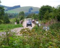 <I>Do you know Gladys, for some reason I suddenly fancy a 'Wispa'</I>. A strange-looking 0-4-0 crossing the Tweed southbound at Cardrona on Sunday 8 August 2010 with one of the occupants showing signs of post-hypnotic suggestion [see image 30173]. <br><br>[John Furnevel 08/08/2010]