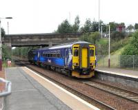 156 514 pulls into Carmyle heading for Whifflet on 14 August. Although it is five miles from Glasgow Central there are no intermediate stations (a surprisingly long stationless stretch in Glasgow terms) and running is mostly fast. Passengers can therefore get into or out of Central Glasgow in only a few minutes.<br><br>[David Panton 14/08/2010]