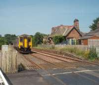 The Closed S&C station at Culgaith sees a Sunday Dales Rail Service from Preston, formed by 156483, running north on its way to Carlisle. The old station building, and its up platform, can still be seen in this view from the level crossing towards the short tunnel and Langwathby.<br><br>[Mark Bartlett 15/08/2010]