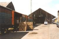 Trans-shipment activity at Leith South (aka South Leith) goods depot in the 1980s. View is west from the entrance from South Leith (aka Leith South) yard. The depot was later 'rationalised' and the main goods shed replaced with a modern structure, but much too late. It was subsequently sold on to a private company. [see image 11661].<br><br>[Jim Peebles //]