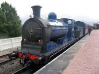 Caley Jumbo 0-6-0 828 waits with the packed 12.30 to Broomhill at Aviemore station on 12 August 2010.<br>
<br><br>[Mark Poustie 12/08/2010]