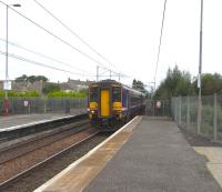 Coatbridge Central has experienced a varied level of service over its existence, from good to a period when the service was skeleton and the station lost all its platform buildings.  The station still has a somewhat bleak appearance, but is currently served by hourly trains on the Cumbernauld to Motherwell line and one or two electric services in the morning and evening peaks start or terminate here (extended from the Blantyre side of the Hamilton Circle).  A Cumbernauld to Motherwell service pulls into the southbound platform on 14 August formed by 156 474.<br><br>[David Panton 14/08/2010]