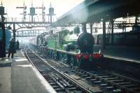 Ex-GNSR 4-4-0 no 49 <I>Gordon Highlander</I> leads ex-GWR 4-4-0 no 3440 <I>City of Truro</I> into Glasgow Central on 3 September 1959 at the head of a special. The train was one of several run in connection with the <I>Scottish Industries Exhibition</I> taking place at various locations throughout Glasgow at that time, including the Kelvin Hall.<br><br>[A Snapper (Courtesy Bruce McCartney) 03/09/1959]