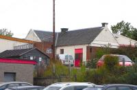 The former Wemyss Castle station is almost entirely hemmed in by <br>
subsequent building, and this partial view of the frontage is all that's possible in August 2010. Although called Wemyss Castle it was right in the middle of East Wemyss and the only station in the village; the castle is a mile and a half away and just outside West Wemyss. There was a West Wemyss station on the same line, but it was no nearer West Wemyss village and you had to go through the larger Coaltown of Wemyss to get there... <br>
 <br>
<br><br>[David Panton 21/08/2010]