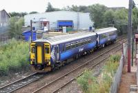 156 445 in retreat from the platform lines at Whifflet on 14 August 2010. The unit is stabled behind the station pending a scheduled return working to Glasgow Central.<br><br>[David Panton 14/08/2010]