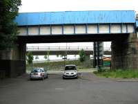 Looking towards the Clyde from the south end of Ferry Road, at the point where it is crossed by a section of the Kelvinhaugh Viaduct.<br><br>[Alistair MacKenzie 23/06/2010]