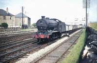 One of St Margaret's J38 0-6-0s no 65919 takes a freight west through Saughton Junction in July 1959.<br><br>[A Snapper (Courtesy Bruce McCartney) 31/07/1959]