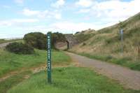 The trackbed of the Moray Coast route heading east from Portgordon to Buckpool. This is now a cyclepath/walkway ending just to the west of Buckpool due to a bridge removal.<br><br>[John Gray 22/08/2010]