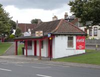 78 years since it last saw a 'car' this East Wemyss relic of the Kirkcaldy to Leven tramway is still known as 'The Car Shed' and the name is shown on that bus stop. Non-urban tramways tended to close earlier than their city counterparts - presumably this was because of bus competition on roads where the bus could actually be quicker.<br><br>[David Panton 21/08/2010]