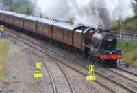 Ex-LMS Jubilee class 4-6-0 no 5690 <I>Leander</I> comes off the WCML at Farington Curve Junction on 28 July 2010 with <I>The Fellsman</I> bound for Carlisle via the scenic route.<br><br>[John McIntyre 28/07/2010]