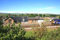 View west over Sanquhar station on 13 July 2010 with the 12.19 service to Glasgow Central departing.<br>
 <br><br>[Peter Rushton 13/07/2010]
