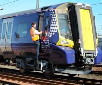 The first of the new 380 units, no 380106 has now arrived at the Polmadie Commissioning Facility where it is seen in the sidings on 27 August 2010.<br><br>[Transport Scotland 27/08/2010]