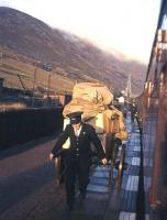 A barrowload of parcels and mail comes off a northbound train at Helmsdale in November 1963.<br><br>[Frank Spaven Collection (Courtesy David Spaven) /11/1963]