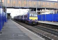 322 483 would have left Shields Depot early on the morning of 28 August 2010 to form the 0702 from Glasgow Central to North Berwick, seen here at the Haymarket stop. The unit will then handle services between North Berwick and Edinburgh for the rest of the day, supplementing the sets stabled at Waverley. Meantime, work progresses at Haymarket on the installation of lifts to serve platforms 2, 3 and 4 which, perhaps surprisingly for such a busy station, have no disabled access.<br><br>[David Panton 28/08/2010]