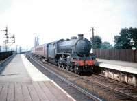 One of  Thornton Junction's stud of B1s, no 61403, brings an Edinburgh bound train off the Forth Bridge and into Dalmeny station on 8 August 1959.<br>
<br><br>[A Snapper (Courtesy Bruce McCartney) 08/08/1959]