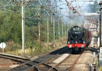 Royal Scot no 46115 <I>Scots Guardsman</I> approaches Balshaw <br>
Lane Junction on the WCML on 4 September 2010 as it heads south on the Up Fast with <I>The Lune Rivers Trust</I> private charter from Carnforth to Chester via Hellifield. The Up Slow line can be seen on the lower left of the picture as it joins the Up Fast.<br>
<br><br>[John McIntyre 04/09/2010]