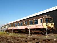 Class 303 set in the yards at Boness on 4 September. The SRPS  has started an appeal with the aim of constructing a large carriage shed to accommodate vehicles like this awaiting attention. [See image 10753]<br>
<br><br>[Brian Forbes 04/09/2010]