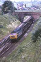 47056 running between Weston Rhyn and Chirk on the Shrewsbury to Chester line in June 1974 with a northbound train of what appear to be empty single bolster wagons. <br>
<br><br>[Bill Jamieson 04/06/1974]
