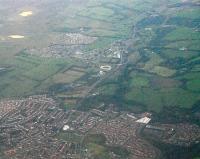 An aerial view along the newly laid A-B. Bottom left was the old Drumgelloch station, moving towards the centre is the new station and the line can be followed east through Plains and out towards Caldercruix.<br><br>[Ewan Crawford 07/09/2010]