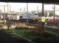 66414 <I>James the Engine</I> leads a container train into Preston station from the north on 8 September, as seen from the <I>Thunderbird Bay</I> looking under Fishergate Bridge. <br><br>[Mark Bartlett 08/09/2010]