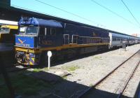 The Indian Pacific on arrival at Sydney Central on 27 September 2008. NR 25 is thetrain enginewith the rear portion - the train is split into two outside Central Station as the platforms are too short for it. She has come all the way from Perth W.A. DL50 (at the platform to the left) joined as helper at Adelaide, marshalled inside the train engine, and has brought in thefront portion. The train engine uncouples, the train is split and thefront portion goes forward while the train engine collects the rear portion. [See image 30638]<br>
<br><br>[Colin Miller 27/09/2008]