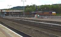 66112 enters Perth with the Inverness small pipes train on 9 September. Note the repairs underway on platform 4.<br><br>[Brian Forbes 09/09/2010]