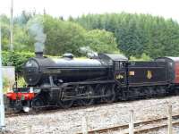 61994 <I>The Great Marquess</I> stands in the sidings at Crianlarich with the service coach on 10 September prior to heading for Oban.<br><br>[Brian Forbes 10/09/2010]