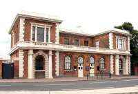 The restored Eastern Counties North Woolwich Railway terminus seen in 2003. Dating from 1847, it became the eastern destination for North London Line services from Richmond following the closure of Broad Street in 1986. The building was latterly put to use as a museum with a more 'functional' replacement ticket office and entrance having been constructed alongside. [See image 31426]<br><br>[John Furnevel 05/06/2003]