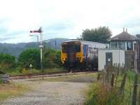 From the trackbed of the old Furness Railway line to Sandside and Hincaster, a Cumbrian Coast service is seen as it leaves the Kent Viaduct and rolls in to Arnside station. 156490 is just passing the old Furness Railway signalbox and the hills behind are on the far side of Kent Estuary.  <br><br>[Mark Bartlett 11/09/2010]