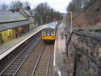 142040 is about to depart from New Mills Central and return to <br>
Manchester Piccadilly with a Sunday evening service on 27 January 2008. As a result of engineering work in the Chinley area all Sheffield services were being terminated at New Mills Central with a bus replacement for the rest of the journey.<br>
<br><br>[John McIntyre 27/01/2008]