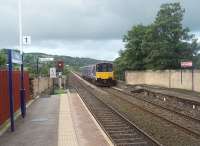 A new signal, controlled from Horrocksford Junction, has been installed at Whalley during the line upgrade and means that southbound trains no longer have to wait at Clitheroe while the preceding service clears Daisyfield Junction. 150141 leaves the long viaduct, reputed to contain 7 million bricks, and enters Whalley on its way to Clitheroe. [See image 10011]<br><br>[Mark Bartlett 16/09/2010]