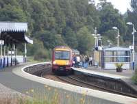 170 475 stands at Dunfermline Town with a service for Edinburgh and <br>
Newcraighall on 4 September. The station opened as plain Dunfermline, later gained the suffix 'Lower', lost that for 30 years then 'Town' was added in 2000 when Dunfermline Queen Margaret opened. There was a proposal by the local MSP a couple of years ago to have the station renamed 'Dunfermline City'. Among the arguments against this was the not unreasonable one that Dunfermline is not in fact a city and that it would require an act of Parliament to make it one. If and when Dunfermline ever obtains city status the station will no doubt change its name again, but we could all be deid by then. <br>
<br><br>[David Panton 04/09/2010]